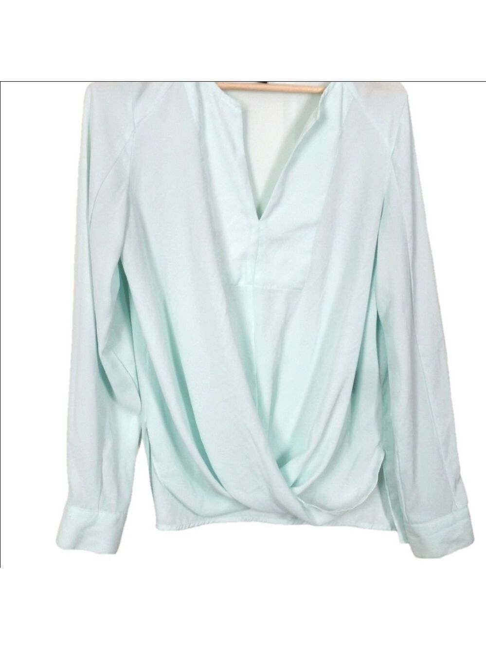 Beautiful pale blue femine flowy blouse. Size Medium. Perfect condition.